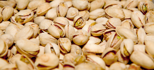 Pistachio texture. Nuts. Green fresh pistachios as texture