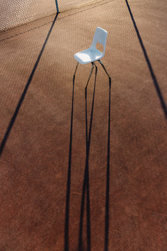 Chair on Tennis Court