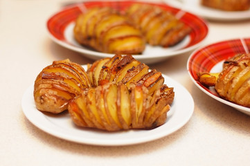 Tasty baked potato baked whole with lard