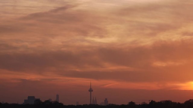 Timelapse of sunrise over cityscape of Cologne Germany
