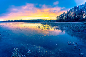 Frozen lake at sunset. Photo from Kajaani, Finland.