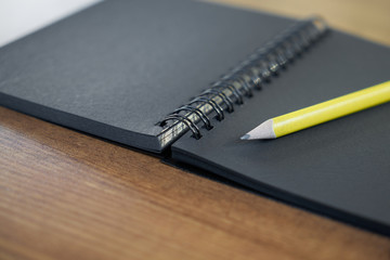 pen and notepad on the table