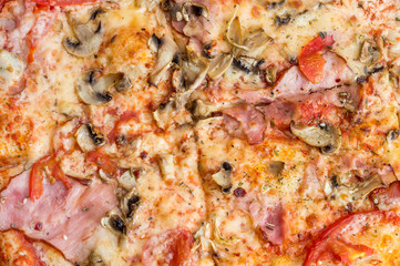 Cutted pizza as food background. Top view.