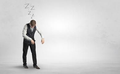 Tired businessman with sleeping sickness going somewhere
