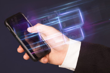 Hand using  phone with database reports and online work concept
