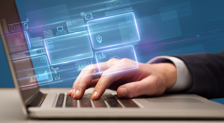 Hand typing on laptop with online accounting system concept
