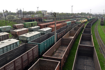 Fototapeta na wymiar Commodity Railway Station. Top view of a Freight wagons. Transportation and Industrial concept