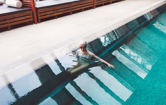 Woman Relaxing in Spa Swimming Pool