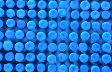 Blue plastic buttons background/ texture. Texture mosaic. Colorfull patern. Abstract background