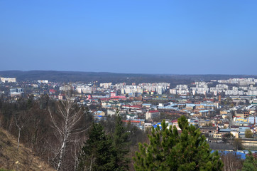 Fototapeta na wymiar Cityscape of Lviv, Ukraine. Top view from Lysa (Lion) hill. Spring panorama