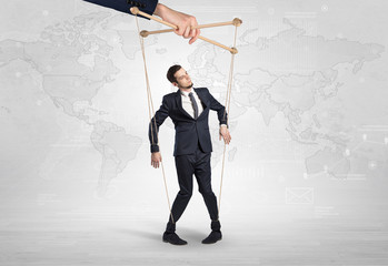 Puppet man with big city great power concept
