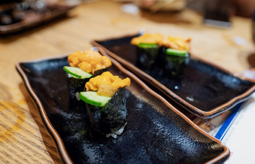 Japanese food, Fresh Uni sushi with cucumber