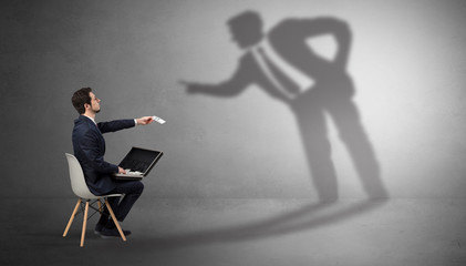 Businessman staying and offering stuffs to a shadow businessman
