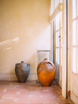 An interior element in the house with a window and yellow walls