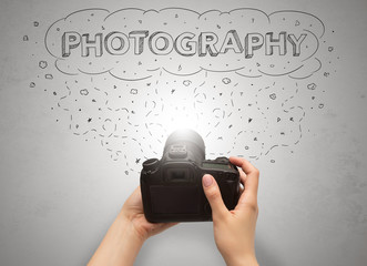 Naked hand photo shooting with message cloud concept and doodles
