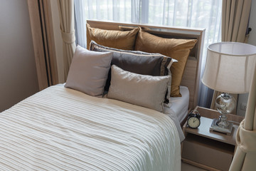 Fototapeta na wymiar luxury bedroom with set of pillows