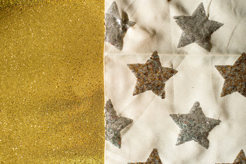 A texture with stars and shiny yellow sparkles