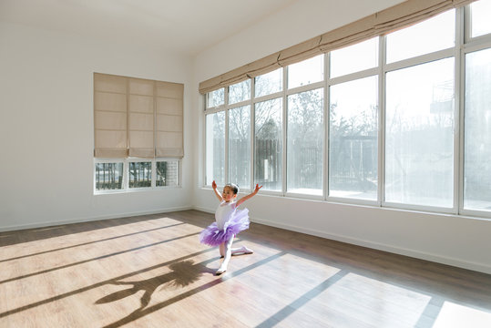 Girl dancing in ballet studio