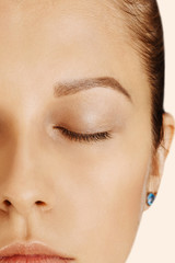 Beautiful girl with closed eyes and perfect skin with natural make-up. Natural beauty, cosmetology and skin care