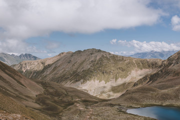 Fototapeta na wymiar Lake scenes in mountains, national park Dombai, Caucasus, Russia, Europe