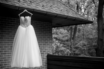 White wedding dress on hanger