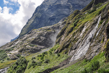 Obraz premium Waterfall scenes in mountains, national park Dombai, Caucasus, Russia, Europe