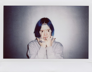 young woman showing middle fingers