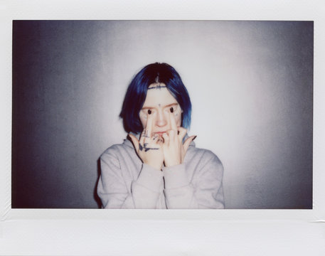 young woman showing middle fingers