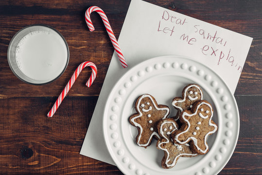 Gingerbread man cookies, candy canes, and a message for Santa