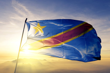 Congo The Democratic republic flag textile cloth fabric waving on the top sunrise mist fog