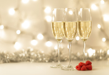 Christmas background with champagne and lights