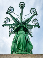 Detail of the Eight-armed gas lamp candelabra on Hradcany Square in Prague