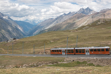 Fototapeta na wymiar Gornergrat train with tourist is going to Matterhorn mountain
