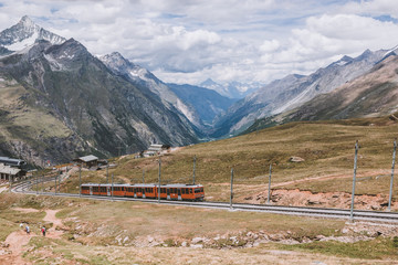 Obraz na płótnie Canvas Gornergrat train with tourist is going to Matterhorn mountain