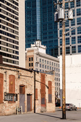 the other side of downtown, view of Salt Lake city old buildings surronded by skyscrapers. Utah. United States
