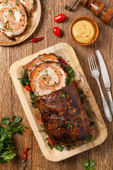 Roasted whole, stuffed with minced pork neck.