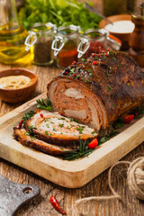 Roasted whole, stuffed with minced pork neck.