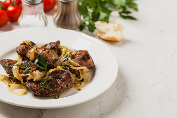 Fried chicken liver with onions.