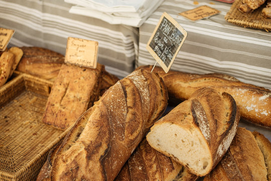 Fresh traditional french bread selling on a marketplace