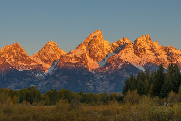 Scenic Sunrise Landscape of the Tetons in Autumn