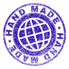 HAND MADE stamp print with grunge texture. Blue vector rubber seal print of HAND MADE tag with grunge texture. Seal has words placed by circle and globe symbol.