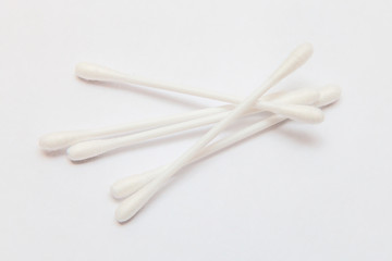 scattered white cotton swabs