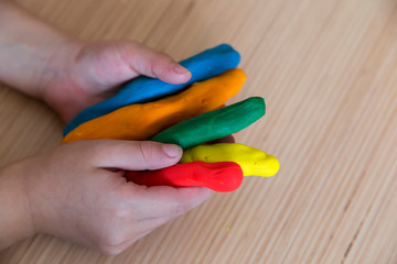 Playing with play dough for children’s activities in preschool or nursery.creative ideas for child development.back to school and happy teachers day concept.