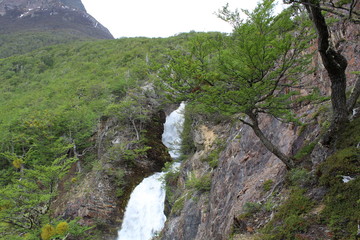 Fototapeta na wymiar Waterfall on the mountain