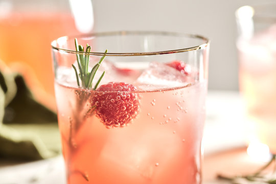 Rock glass of delicious raspberry and rosemary.