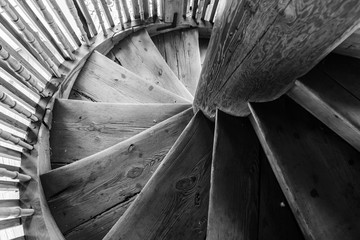 old retro wooden spiral staircase in the ancient bell tower of the Orthodox Church in Russia....