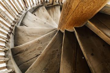 wooden spiral staircase in the ancient bell tower of the Orthodox Church