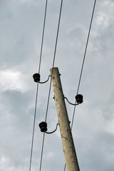 Power pole with a grey skyed background