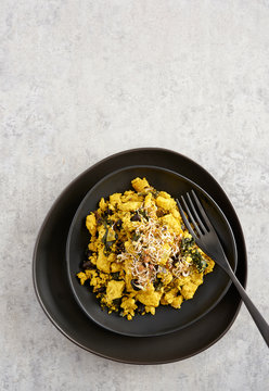 Scrambled Tofu on Black Plate