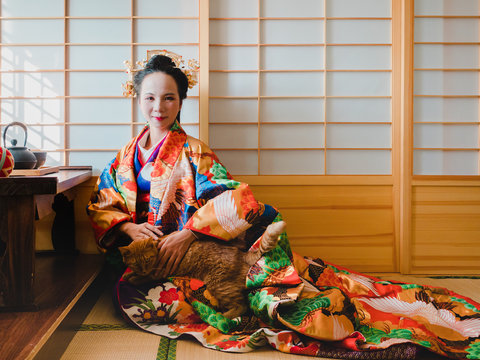 Asian Woman In Traditional Kimono Clothing